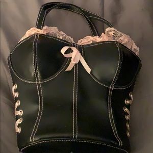 Black corset purse color black and baby pink.